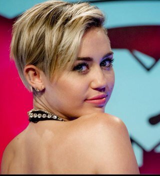 Get ready for the Miley Cyrus take over October8th #Bangerz! I like her better now shes badass! Shes not Hannah Montana shes Miley GETOVER IT EVERYONE GROWS UP!