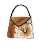 Luxury Handbag Line designed by Internationally known artist, Nall.