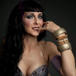 Professional Make Up Artist for TV and Film, Professional BellyDancer, Artistic Director, Dalmatian crazy, cat loving co ring leader at The Villa DeVilla.