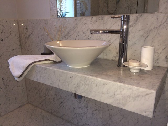 We are a family run business specialising in all aspects of natural stone and quartz including: granite worktops / bartops / bespoke marble bathrooms.