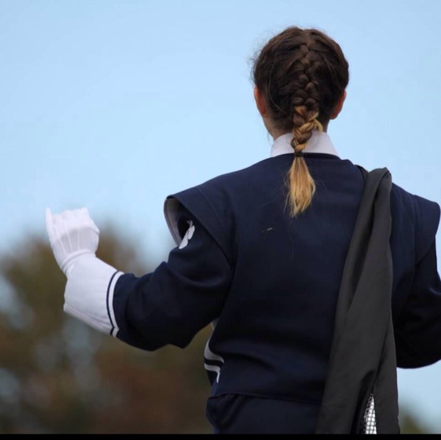 Female flute/piccolo. Super High School Level Drum Major.