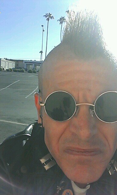 Me..I'm an old-school Punk Rock guitar playing, guy-next-door,professional role model, international play boy, super model. C'Mon into my special world.