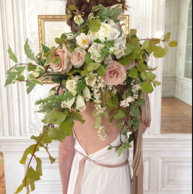 Wedding florist creating garden-inspired flower arrangements for the bride who's wild at heart.