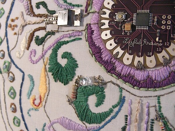 EvrthngETextile's profile picture. What are e-textiles? Fabrics that enable digital components or electronics to be embedded in them.