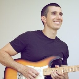 Guitar teacher and music education designer