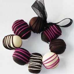 WhiteDragon chocolate jewelry, sheep jewelry and figures.