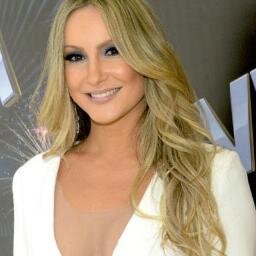 Cantora de Axé e música pop, compositora, empresária, dançarina e produtora.