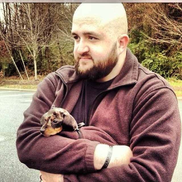 combat infantry veteran (OIF5). mini Dachshund lover. Bald and beautiful. Bearded man.