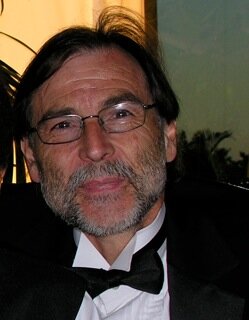 Dr Dominique Dock, MD, NLP Master, trained in conventional and alternative medicine
