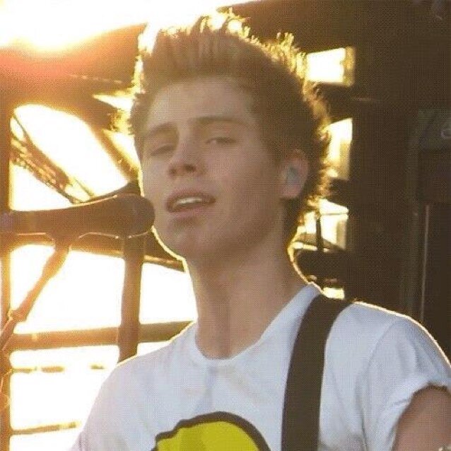 Luke hemmings is my sunshine. He saved me when the darkness was closing in and he pulled me back into the light:)