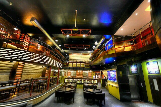 microbrewery,  restaurant, open terrace, night club, music venue, football local, pizzeria and awesome watering hole