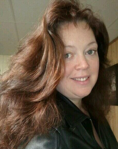 Happy owner of Rejuvenations Massage and Spa, downtown Racine.  Call me for a massage or facial today. (262) 637-7151