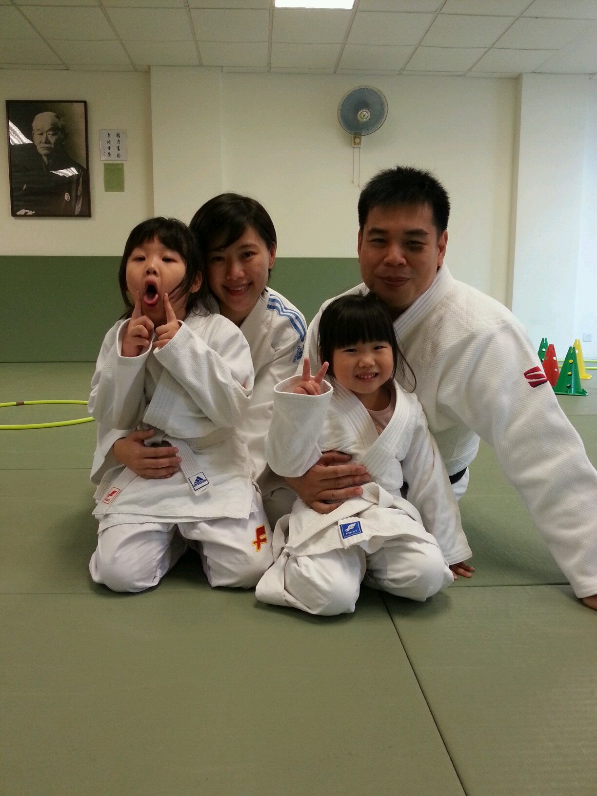 SUSS, SIM & The Dojo's judo coach