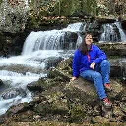 Living in an off-grid home in Tennessee, writing young adult novels and how-to books, as well as creating abstract art.