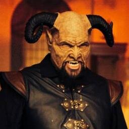 Primordial Demon; a Devil, older than man. A Soul Wrangler, keeping malicious spirits at bay in the living world. Enjoys reaping, beer, burritos & baked goods.