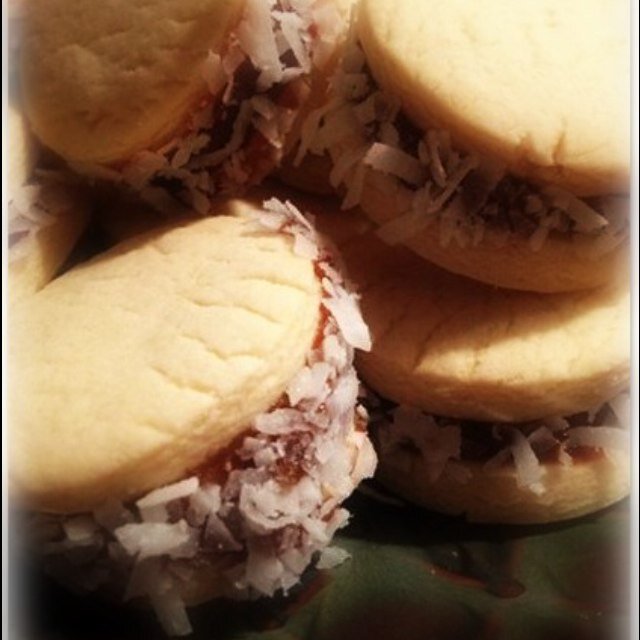 Traditional Alfajores: Delicate sandwich cookies, filled with silky dulce de leche, & finished with coconut or chocolate 
CATHOLIC COOKIE MAKER & PATRIOT  J+M+J