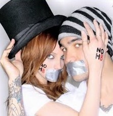 The NOH8! Campaign is a photo project & silent protest in direct to response to the passage of the Proposition 8.