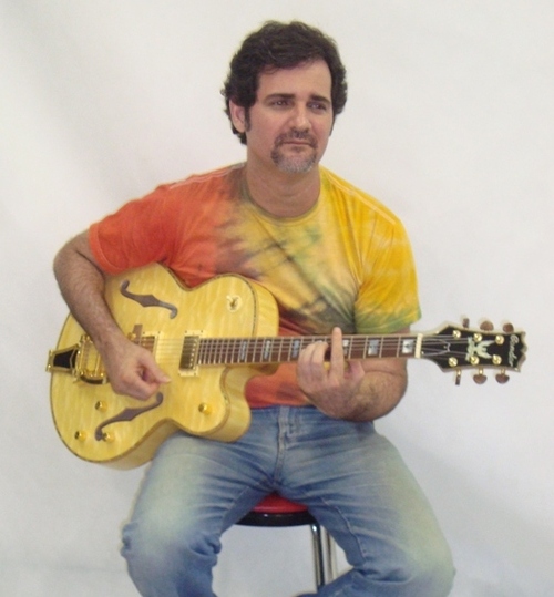 Músico,guitarrista, Violonista compositor.