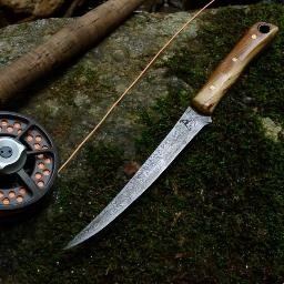 A traditional blacksmith shop specializing in forged kitchen cutlery, tools, and home furnishings all handmade by Reed Moore.
