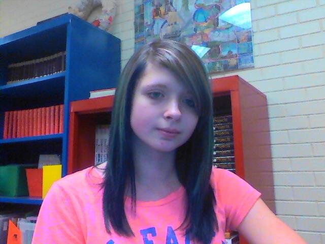 Scene, Blue/ Pink hair, shortish, 16, Loves the color black, Rock, Pop, Hanging with friends, Singing, and Dancing,