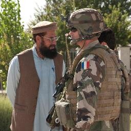 ISAF and the Afghans. Guess which one's got the Kevlar?