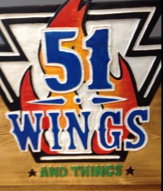 We are a wing shop with dine-in, delivery, and take-out. We feature wings but also have a full menu of salads, burgers, subs, and more. Come check us out!