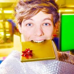 LOUIS WITH A CHRISTMAS BOW ON HIS HEAD