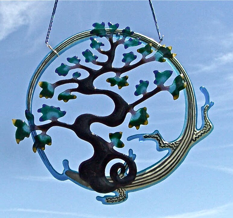 Tenacious, rock climbing, hula hooping, glass and fabric artist who loves color and texture.