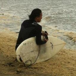All you need in life to be happy is a sunset, surfboard, and a beer in your hand.