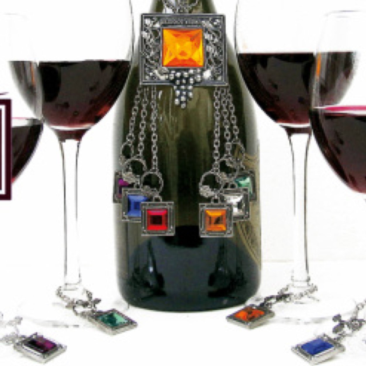 We are the creators of Winery Toggles, a gift that serves as a beautiful bottle adornment as well as individual glass identifiers. Perfect for entertaining!