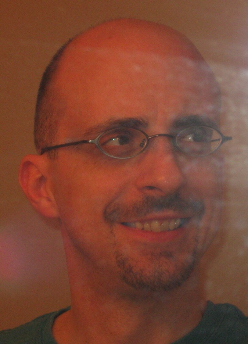 Open-minded humanist, skeptic, idealist, possibly insane