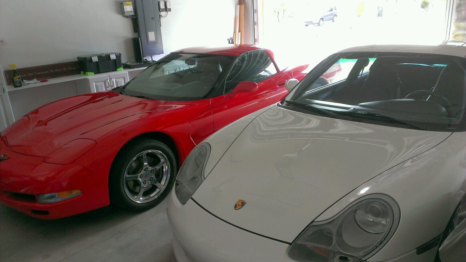 The old coach, gotta love your kids and cars.