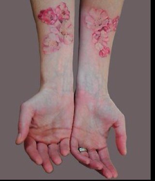 She paints a pretty picture, but this story has a twist. Her paintbrush is a razor and the canvas is her wrist.