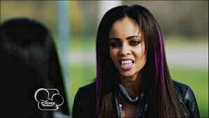 *hisses* I'm the evil twin of @imsarahthevamp. Beware of the purple streaks and purple eyes. And most importantly, watch out for the fangs.