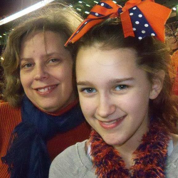 Mom. Auburn fan. Disney-phile.