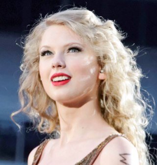 Drop everything now, meet me in the pouring rain, kiss me on the sidewalk, take away the pain. I see sparks fly whenever you smile