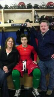 Hockey mom & loving it.