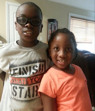 Wonderful husband Travis, with loving grand kids Tavis and Kyla