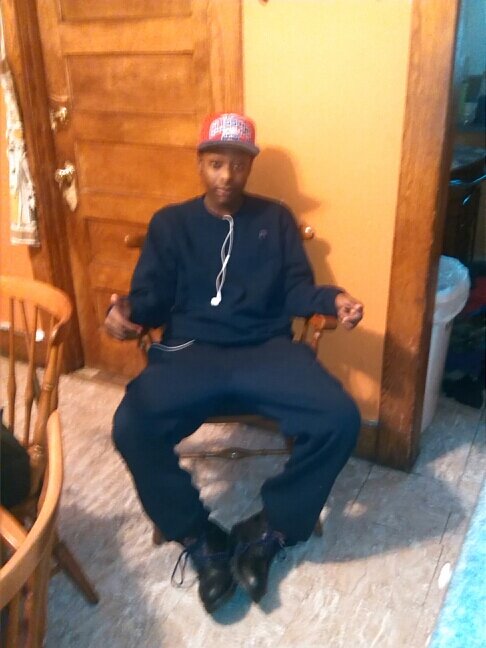 young african american boy, play basketball and football, do music, and a artist
