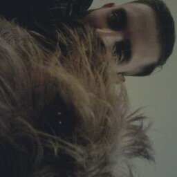 tokenmalik's profile picture. headphone commuter