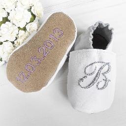 Handmade personalised leather baby shoes with names and birth/Christening details embroidered onto soles. NOTHS partner.