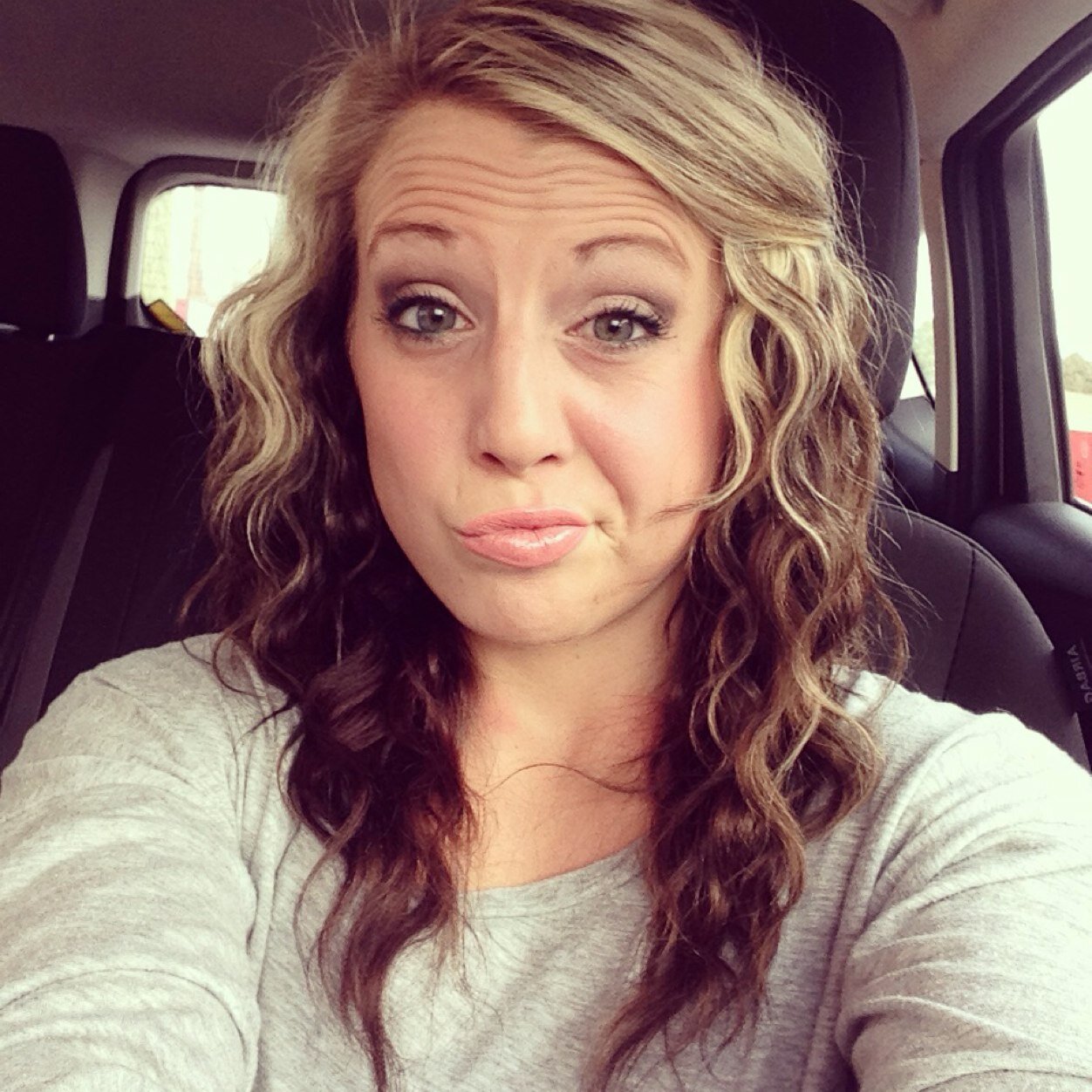 Short, blonde, active.