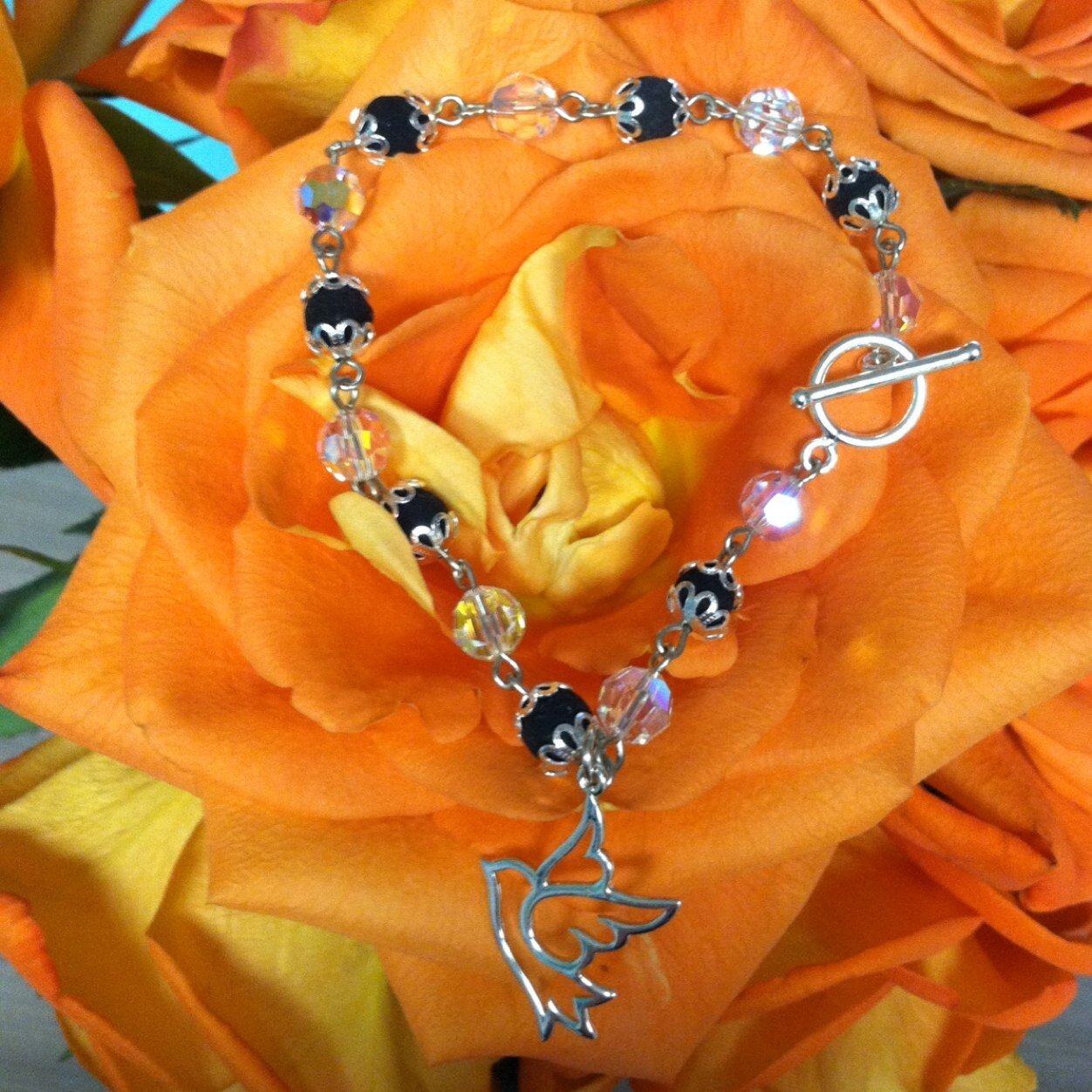 We specialize in processing your roses from funerals and other occasions into rose beads to be set is rosaries, keepsakes, and fine jewelry.