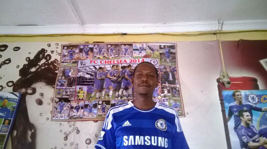 Loves Chelsea FC  grilled chicken and a Tusker Lager