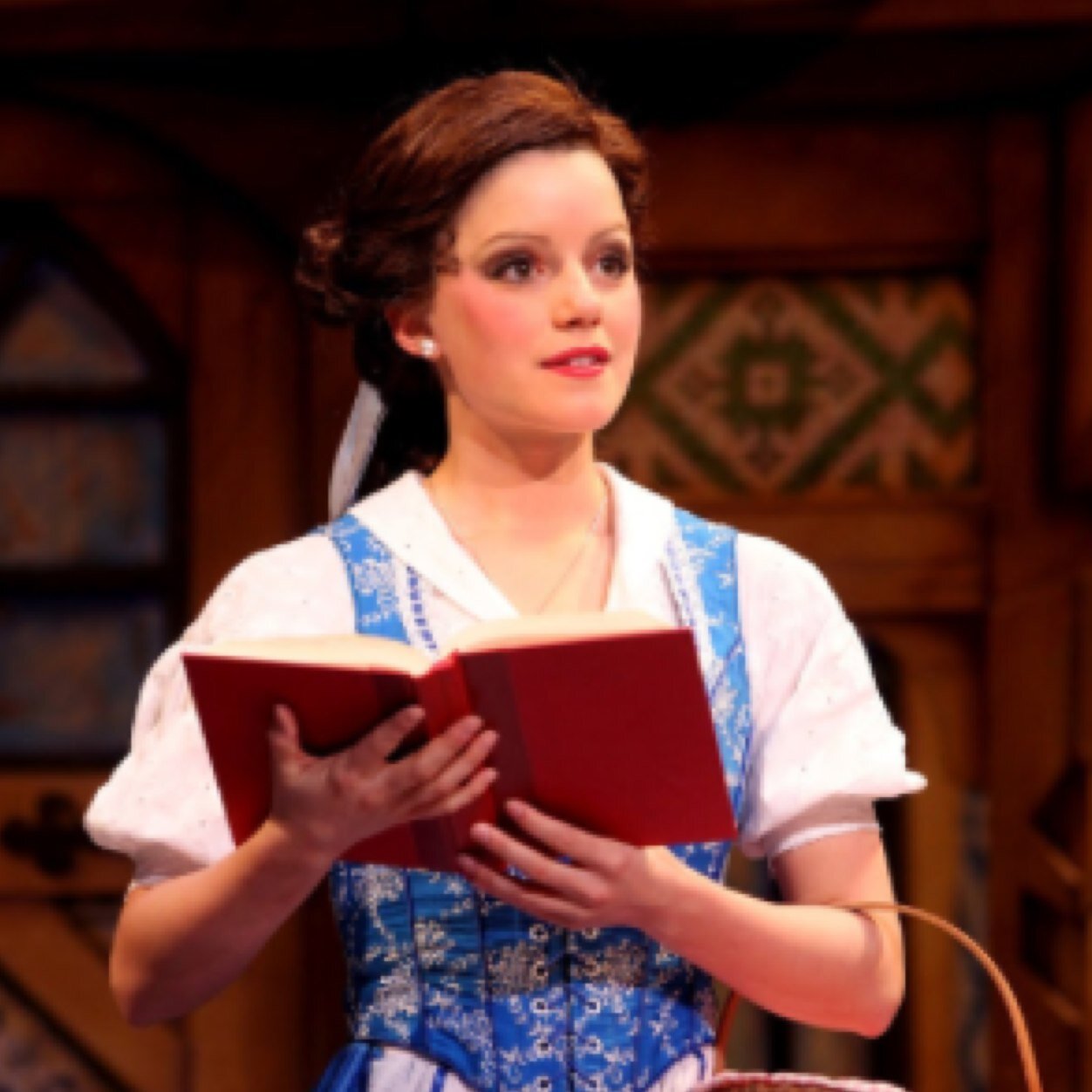 Just a lowly college actress who dreams of making it big.