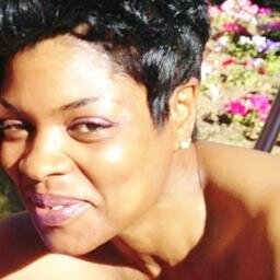 TaushaJ1's profile picture. extremely proud melanoid woman