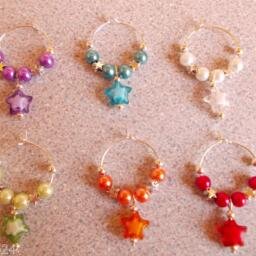 specialise in wine glass charms, but also make earings, key rings and braclets. find us on facebook for every update. I do post internationally.