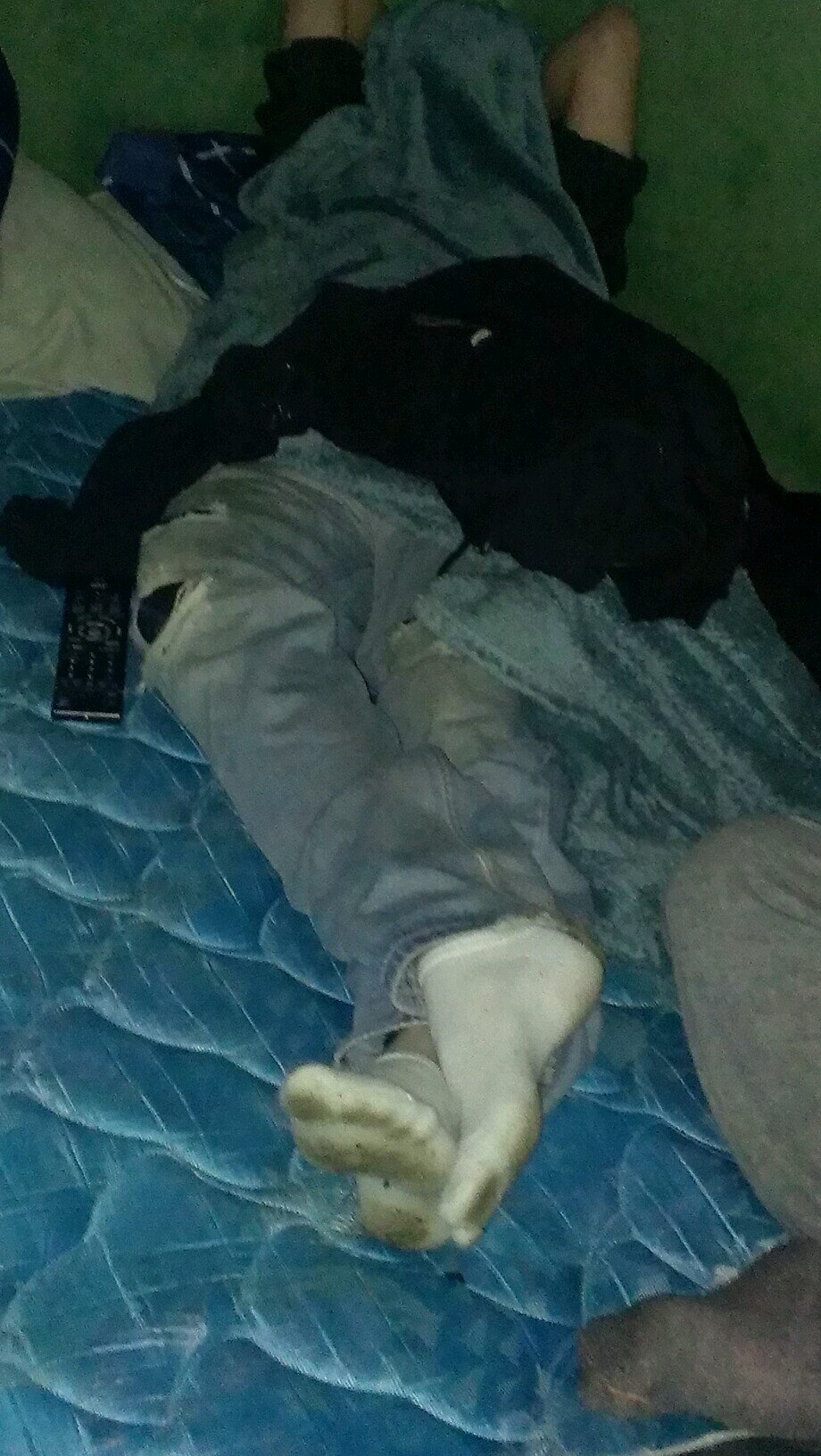 Just Tom, wearing a blanket