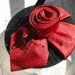 Designer specializing in UpCycling with a focus on Fascinators and Hats sophisticated and whimsical Dare to be Different by wearing one of my creations!