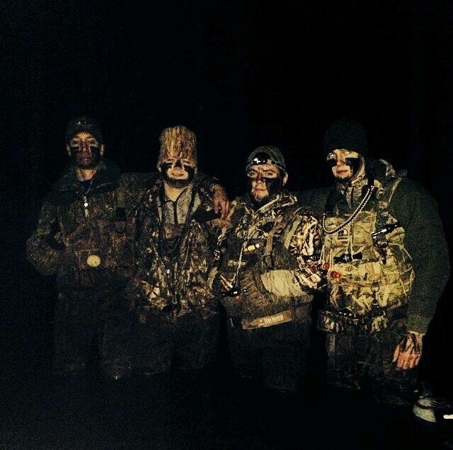 A group of guys chasin ducks through the backwater's of arkansas.                                 Owners of BackWater Calls